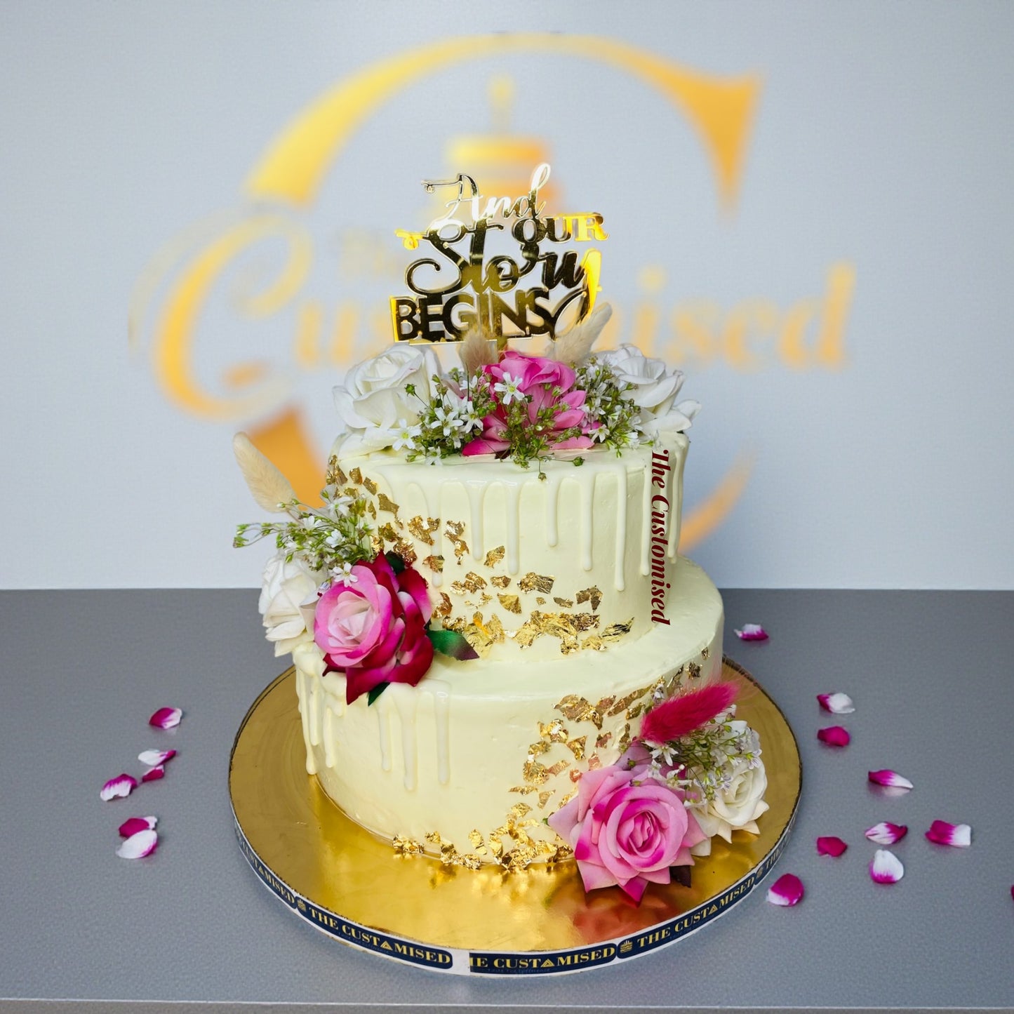 White Drip Floral Engagement Cake